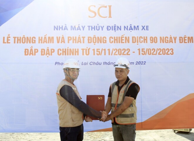 The Ceremony of Tunnel Breakthrough and Launching the 90 day-and-night campaign of the main dam embankment at Nam Xe HEP